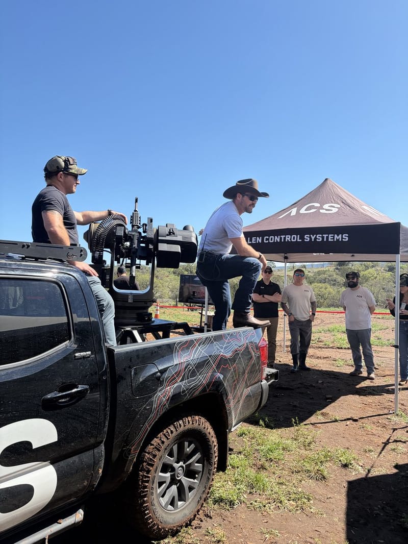 The Allen Control Systems team in the field with a Bullfrog system and the ACS tent